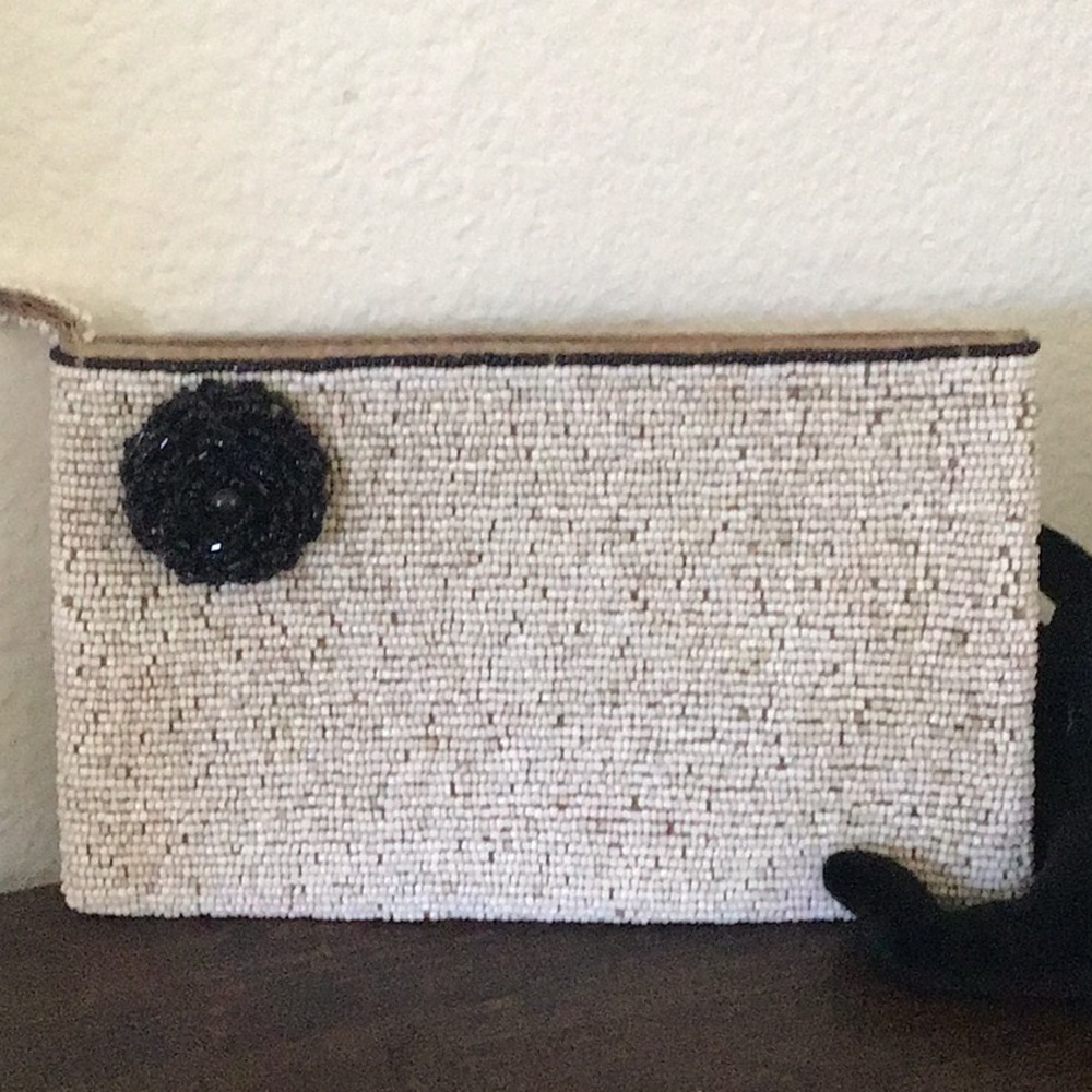Hand beaded clutch wristlet